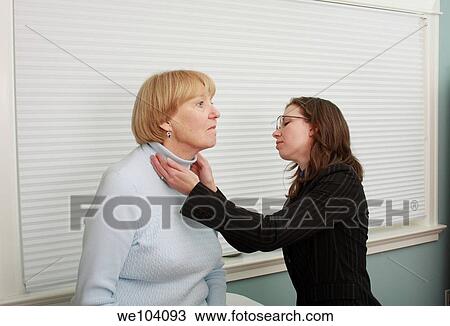 Aromatherapist examines patients neck View Large Photo Image Stock Image - Aromatherapist examines patients neck. Fotosearch