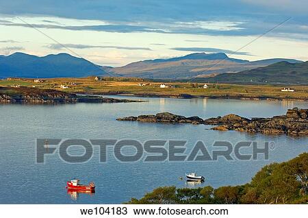 Boats at sunset in Loch Scridian, Mull, Inner Hebrides, Argyll and Bute, Scotland, United Kingdom, Europe View Large Photo Image Stock Image - Boats at sunset in Loch Scridian, Mull, Inner Hebrides, Argyll and Bute, Scotland, United Kingdom, Europe. Fotosearch