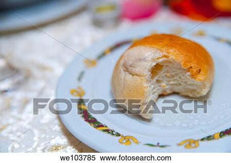Bread bun with bite mark View Large Photo Image Stock Photography - Bread bun with bite mark. Fotosearch