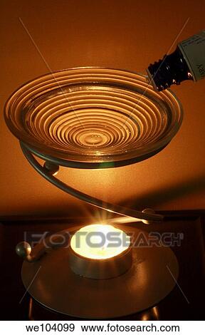 Candle essential oil burner used in aromatherapy View Large Photo Image Stock Photo - Candle essential oil burner used in aromatherapy. Fotosearch