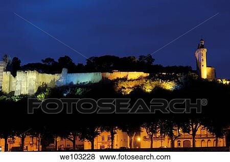 Chinon Castle at dusk, Chinon, Indre-et-Loire, Loire Valley, France View Large Photo Image Stock Photo - Chinon Castle at dusk, Chinon, Indre-et-Loire, Loire Valley, France. Fotosearch