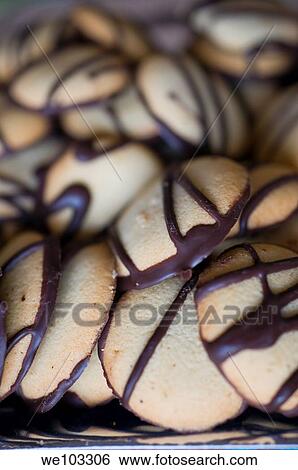 Chocolate covered cookies View Large Photo Image Stock Photograph - Chocolate covered cookies. Fotosearch
