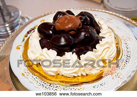 Chocolate profiterole View Large Photo Image Stock Photograph - Chocolate profiterole. Fotosearch