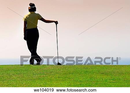Female golfer looking over the situation Golf Club Punta Ala Italy View Large Photo Image Stock Photo - Female golfer looking over the situation Golf Club Punta Ala Italy. Fotosearch