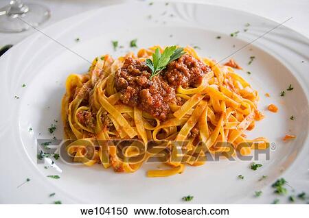 Fettuccine pasta with red meat sauce, Rome, Italy View Large Photo Image Stock Image - Fettuccine pasta with red meat sauce, Rome, Italy. Fotosearch