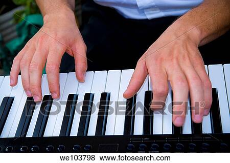 Hands playing piano View Large Photo Image Stock Photo - Hands playing piano. Fotosearch