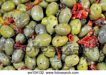 Marinated green olives with red peppers View Large Photo Image Stock Image - Marinated green olives with red peppers. Fotosearch