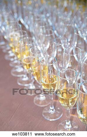 Rows of champagne glasses View Large Photo Image Stock Image - Rows of champagne glasses. Fotosearch