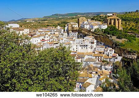 Setenil de las Bodegas, ´Pueblos Blancos´ (white towns), Cadiz province, Andalusia, Spain View Large Photo Image Stock Photography - Setenil de las Bodegas, ´Pueblos Blancos´ (white towns), Cadiz province, Andalusia, Spain. Fotosearch