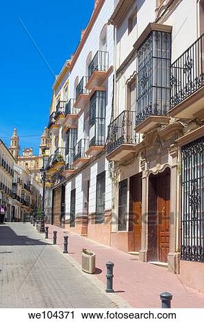 Stock Image - Street and church of Nuestra Señora de la Encarnacion, Olvera Pueblos Blancos ´white towns´, Cadiz province, Andalucia, Spain. Fotosearch