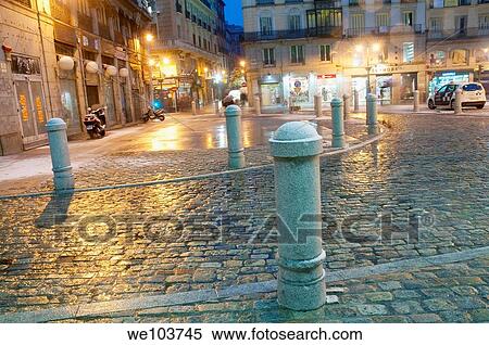 Wet pavement during snowfall, Puerta del Sol. Night view. Madrid, Spain. View Large Photo Image Stock Photography - Wet pavement during snowfall, Puerta del Sol. Night view. Madrid, Spain.. Fotosearch