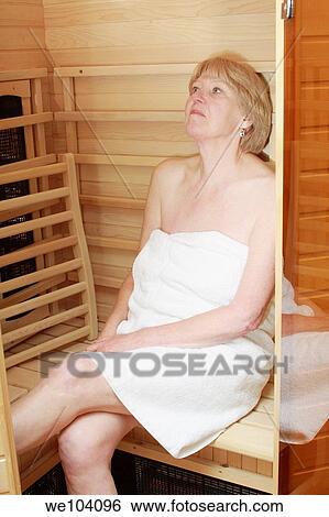 Woman in infared sauna View Large Photo Image Stock Photograph - Woman in infared sauna. Fotosearch