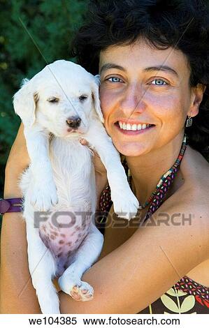 young girl with a dog puppy of the English Setter breed View Large Photo Image Stock Photography - young girl with a dog puppy of the English Setter breed. Fotosearch