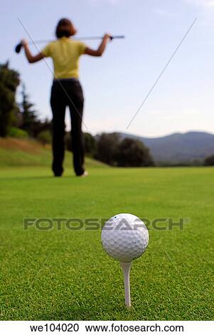 Young woman golfer observing terrain and conditions before hitting View Large Photo Image Stock Image - Young woman golfer observing terrain and conditions before hitting. Fotosearch