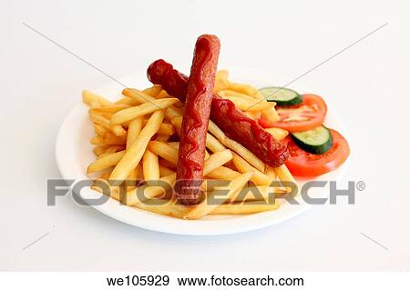 2 hot dog sausages with chips vegetables and ketchup on white View Large Photo Image Stock Photo - 2 hot dog sausages with chips vegetables and ketchup on white. Fotosearch
