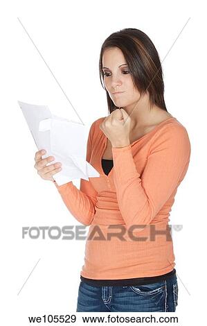 A beautiful Caucasian woman upset about incoming bills View Large Photo Image Stock Photo - A beautiful Caucasian woman upset about incoming bills. Fotosearch