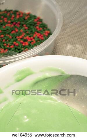 A bowl of green icing and Christmas sprinkles View Large Photo Image Stock Photography - A bowl of green icing and Christmas sprinkles. Fotosearch