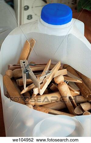 A milk jug full of clothes pins for the washline View Large Photo Image Stock Image - A milk jug full of clothes pins for the washline. Fotosearch
