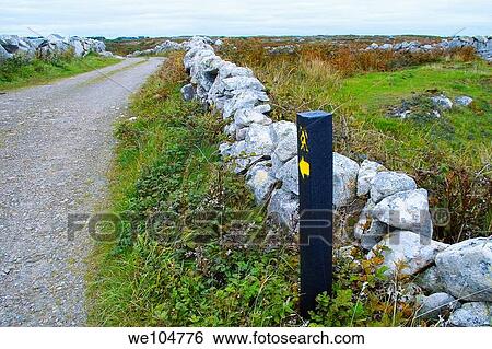 A way marker points the way along the Connemara Way in County Galway, Ireland. View Large Photo Image Stock Photograph - A way marker points the way along the Connemara Way in County Galway, Ireland.. Fotosearch