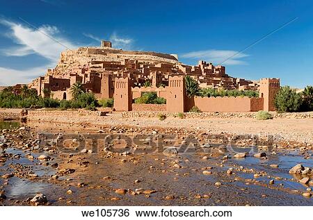Stock Photograph - Ait Benhaddou with shallow water of Ounila River or Wadi Mellah near Ouarzazate Morocco. Fotosearch