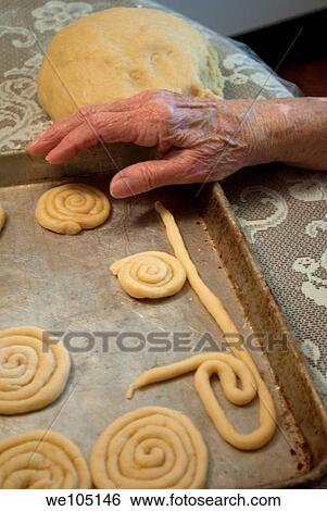 An old woman´s hand resting against a tray of cookies View Large Photo Image Stock Photograph - An old woman´s hand resting against a tray of cookies. Fotosearch