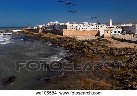 Atlantic coast and sea bastion ramparts of Essaouira Morocco viewed from Sqala du Port View Large Photo Image Picture - Atlantic coast and sea bastion ramparts of Essaouira Morocco viewed from Sqala du Port. Fotosearch