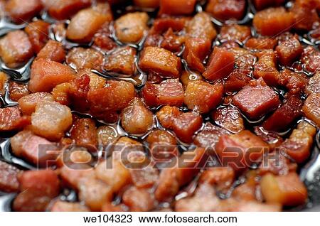 Bacon frying in a pan View Large Photo Image Stock Image - Bacon frying in a pan. Fotosearch