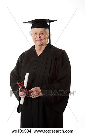Beauitiful Caucasian woman in a black graduation gown View Large Photo Image Picture - Beauitiful Caucasian woman in a black graduation gown. Fotosearch