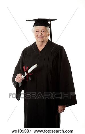 Beauitiful Caucasian woman in a black graduation gown View Large Photo Image Stock Photo - Beauitiful Caucasian woman in a black graduation gown. Fotosearch