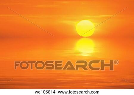 Beautiful and tranquil sunset over the ocean View Large Photo Image Picture - Beautiful and tranquil sunset over the ocean. Fotosearch