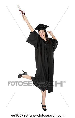 Beautiful Caucasian woman posing in a black graduation gown View Large Photo Image Stock Photograph - Beautiful Caucasian woman posing in a black graduation gown. Fotosearch