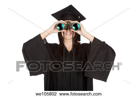 Beautiful Caucasian woman wearing in a black graduation gown and looking through binoculars View Large Photo Image Stock Image - Beautiful Caucasian woman wearing in a black graduation gown and looking through binoculars. Fotosearch