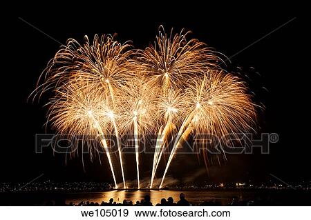 Stock Photo - Beautiful fireworks above English Bay during the Celebration of Lights 2010, Mexico night, Vancouver, British Columbia, Canada. Fotosearch