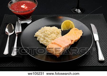 Black table setting with plate of salmon lemon and risotto with borscht soup View Large Photo Image Stock Image - Black table setting with plate of salmon lemon and risotto with borscht soup. Fotosearch