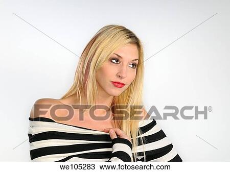 Blond woman with bare shoulders in a black and white sweater on white background View Large Photo Image Stock Image - Blond woman with bare shoulders in a black and white sweater on white background. Fotosearch