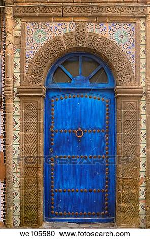 Blue door in Essaouira Medina with ornate stonework and Zellige tilework, Morocco View Large Photo Image Stock Image - Blue door in Essaouira Medina with ornate stonework and Zellige tilework, Morocco. Fotosearch