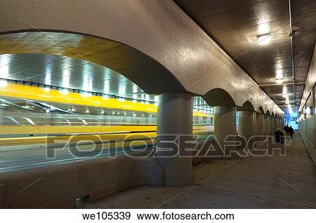 Blurred yellow school bus driving on the new Simcoe street underpass in Toronto View Large Photo Image Stock Photo - Blurred yellow school bus driving on the new Simcoe street underpass in Toronto. Fotosearch