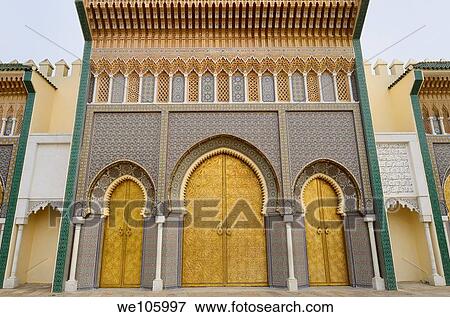 Stock Photo - Brass doors to the Dar El Makhzen the Kings Royal Palace with intricate Zellige tilework in Fes Morocco. Fotosearch