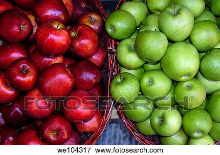 Bright red and green apples in a wooden basket View Large Photo Image Stock Photo - Bright red and green apples in a wooden basket. Fotosearch