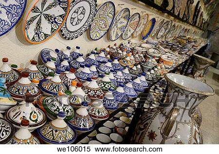 Brightly colored tagine bowls and plates in a ceramic shop in Fes el Bali Medina Morocco View Large Photo Image Stock Photography - Brightly colored tagine bowls and plates in a ceramic shop in Fes el Bali Medina Morocco. Fotosearch