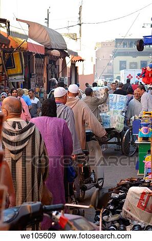 Busy souk market street of Marrakech Morocco crowded with people View Large Photo Image Stock Photo - Busy souk market street of Marrakech Morocco crowded with people. Fotosearch