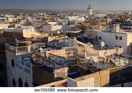 Cement work overlooking rooftops of houses in Essaouira Morocco View Large Photo Image Stock Photo - Cement work overlooking rooftops of houses in Essaouira Morocco. Fotosearch