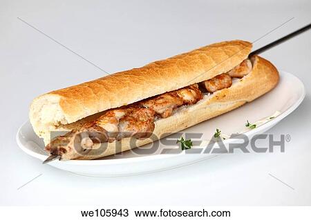 Char grilled Chicken Shish Kebab Skewer baguette sandwich View Large Photo Image Stock Image - Char grilled Chicken Shish Kebab Skewer baguette sandwich. Fotosearch