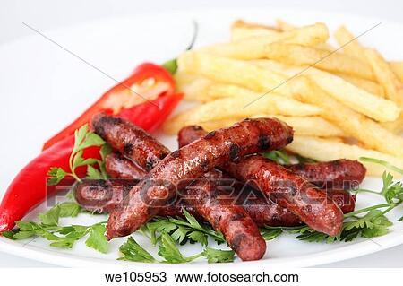 Char Grilled Merguez sausages with french fries View Large Photo Image Stock Image - Char Grilled Merguez sausages with french fries. Fotosearch