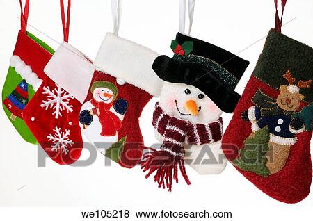 Collection of unique Christmas stockings with snowmen hanging on white background sharp View Large Photo Image Stock Photo - Collection of unique Christmas stockings with snowmen hanging on white background sharp. Fotosearch