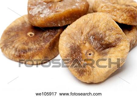 Cut out of dried figs On white Background View Large Photo Image Stock Photo - Cut out of dried figs On white Background. Fotosearch