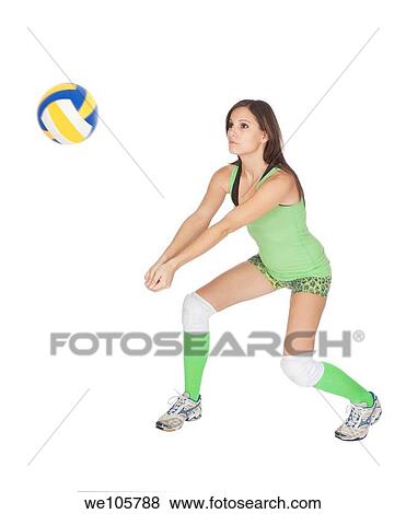 Cute Caucasian woman hitting the ball in volleyball View Large Photo Image Stock Photo - Cute Caucasian woman hitting the ball in volleyball. Fotosearch