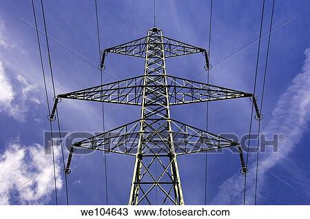Stock Image - Electricity pylon against blue sky. Fotosearch