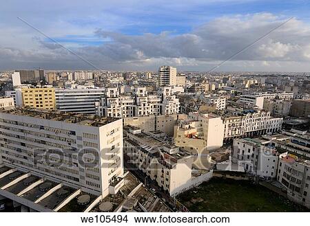 Evening view looking across the white Casablanca cityscape, Morocco View Large Photo Image Picture - Evening view looking across the white Casablanca cityscape, Morocco. Fotosearch