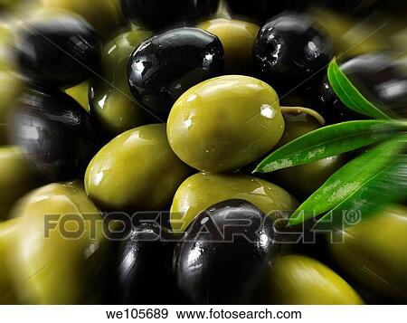 Fresh mixed black and green olives photos, pictures & images View Large Photo Image Stock Photo - Fresh mixed black and green olives photos, pictures & images. Fotosearch
